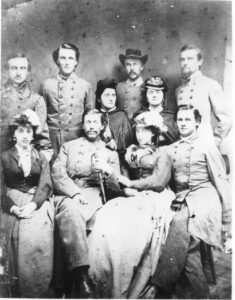 The ladies shown in this photograph - Elizabeth White standing in the center, Annie Hempstone to her left, and Kate and Betsie Ball (probable) – were residents of Loudoun County, VA, and smugglers of military supplies from Maryland back across the Potomac River. (Thomas Balch Library Visual Collections)